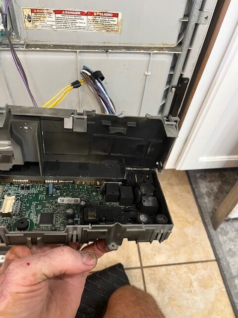 Damaged dishwasher control board affected by power surge